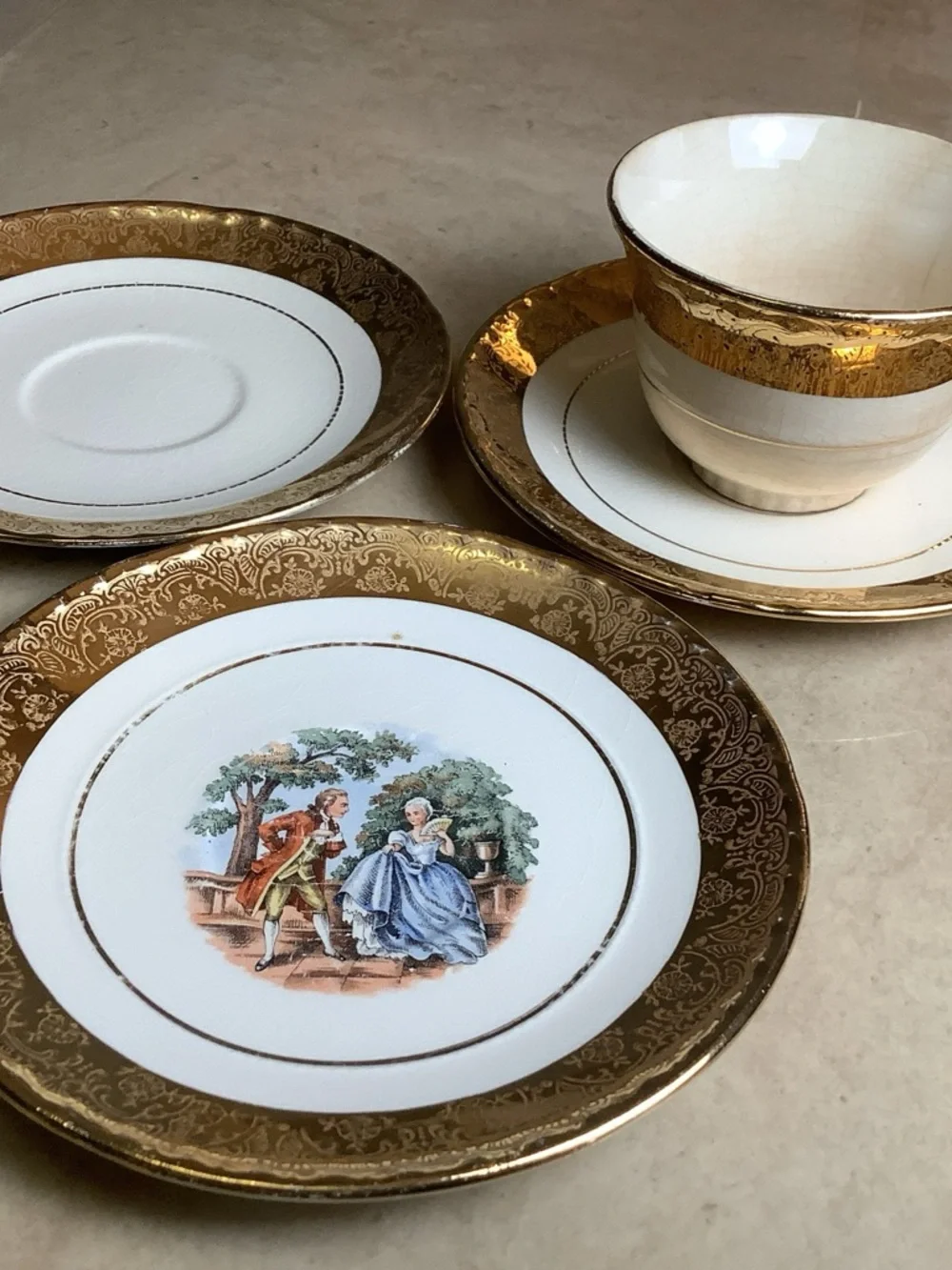 Vintage Crooksville China Co 22K Gold Colonial Courting Couple tea cup & saucers